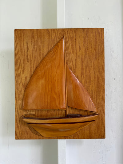 photo of a Vintage Wooden Sailboat Plaque