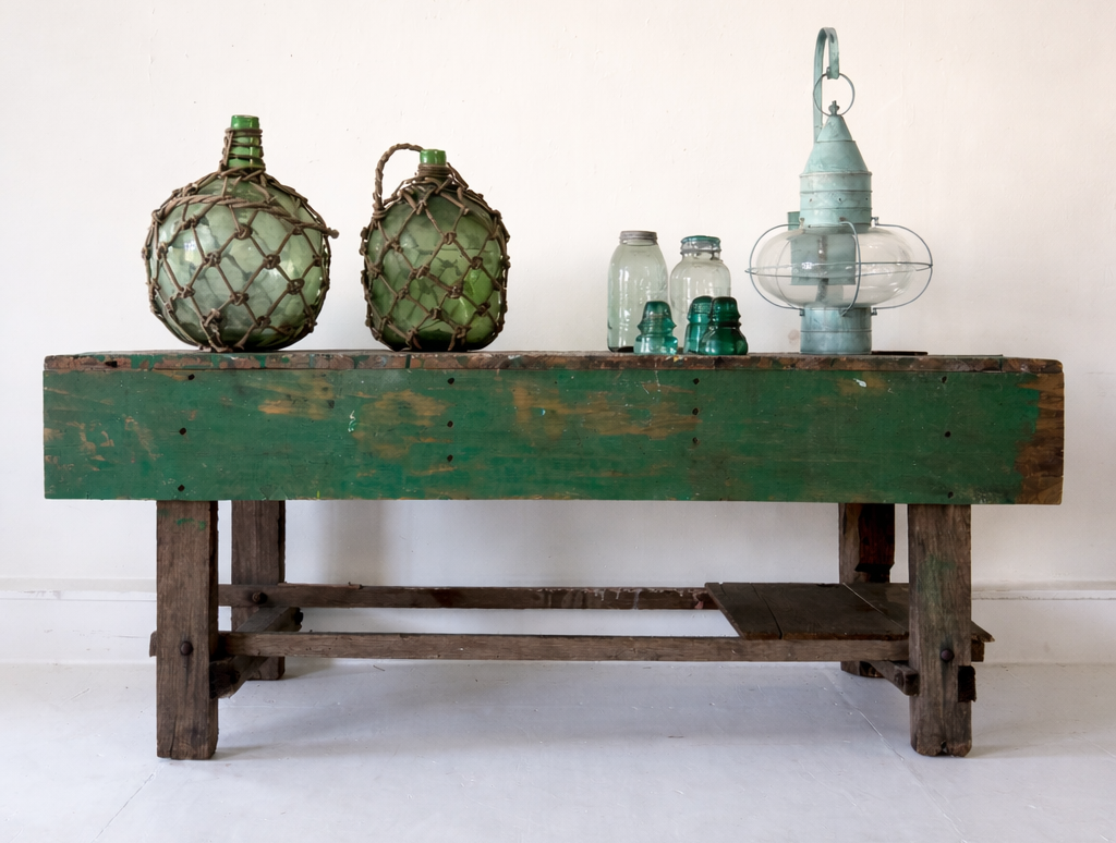 Vintage wooden bench with decorative bottles on a white background