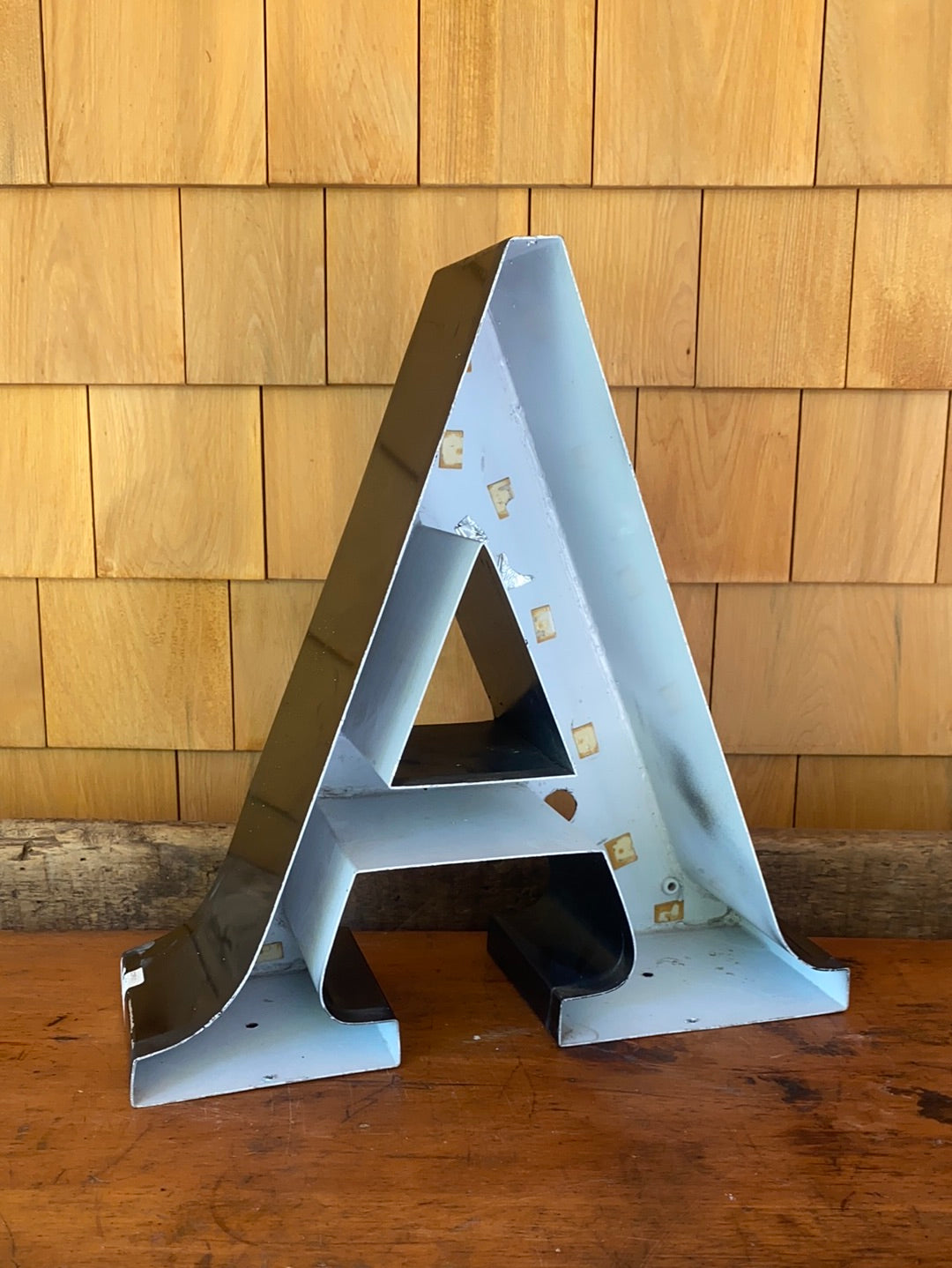 Los Angeles sign of metal letters, hangs from a railing at an architecture  salvage yard Stock Photo - Alamy